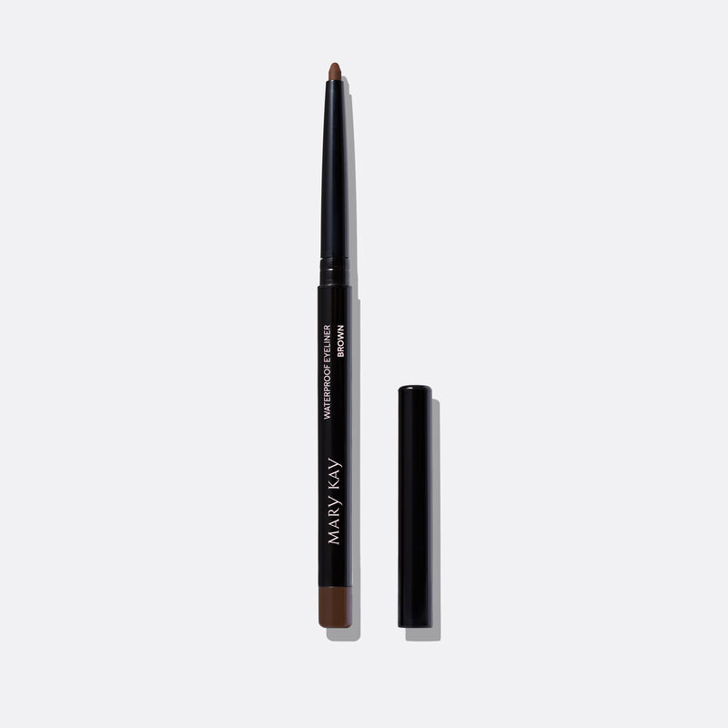 Uncapped Mary Kay Waterproof Eyeliner in Brown against color smudge background.