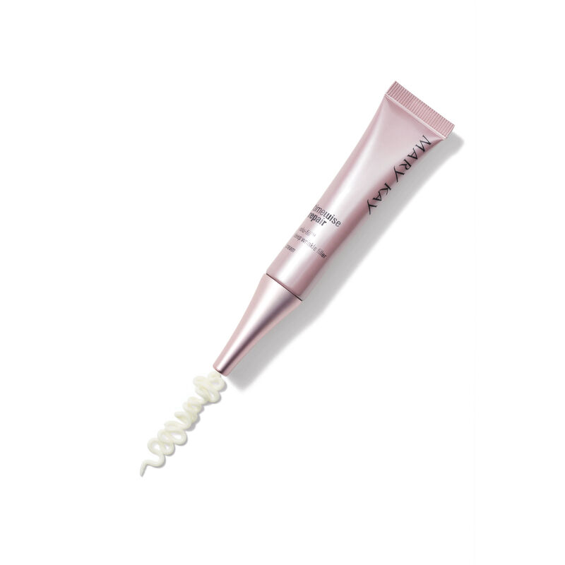 Open tube of TimeWise Repair Volu-Fill Deep Wrinkle Filler with product trailing from tube, against blue background.