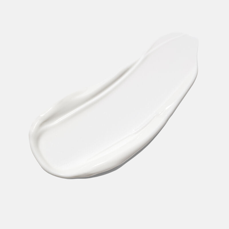 Frottis du Protecteur de jour &Eacute;cran solaire FPS 30 TimeWise sur un fond uni