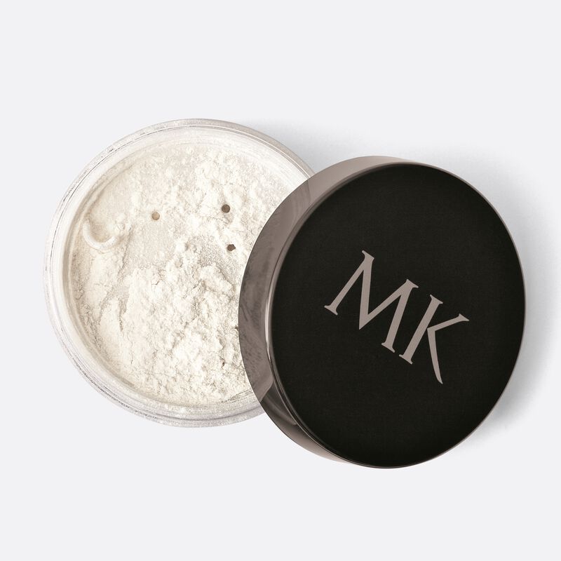 Pot ouvert de la Poudre libre translucide Mary Kay.