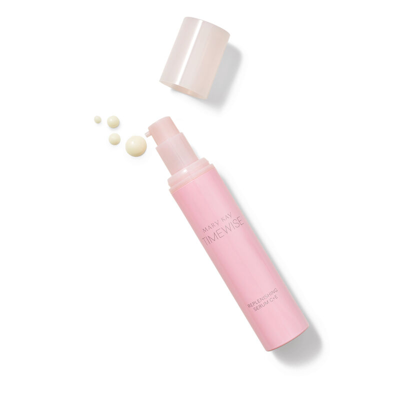 TimeWise Replenishing Serum C+E&reg; being held by a model.