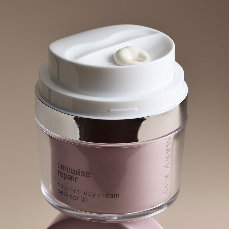 Close-up of Day Cream open jar with formula on top