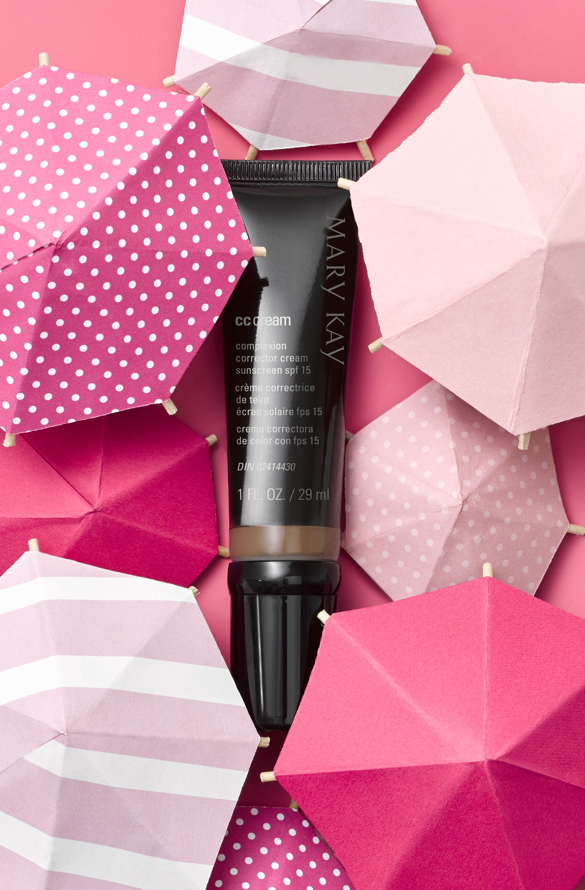 Mary Kay CC Cream surrounded by pink umbrellas